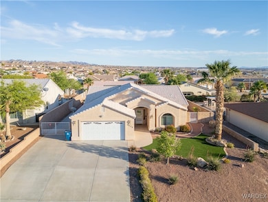 Single story home featuring a garage, stucco sidin