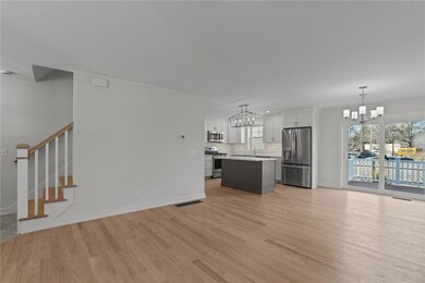 From the front entryway, a view toward the kitchen