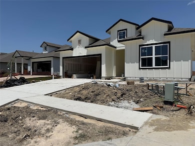 View of front of property with an attached garage