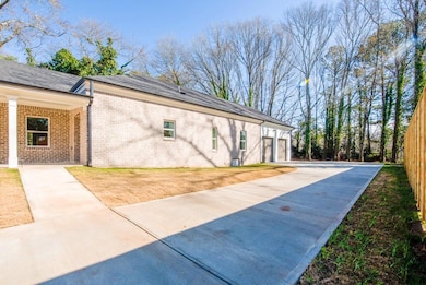 View of property exterior featuring a garage