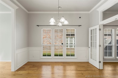 The open Formal Dining area exudes elegance with i