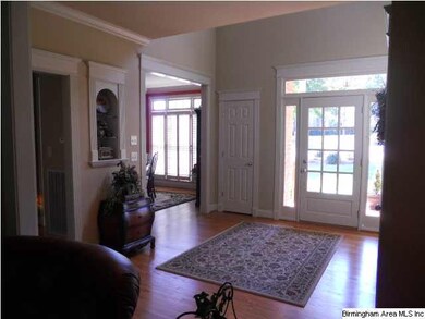 Lare open foyer adds light to the great room area 