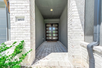 Luxurious covered front entry.