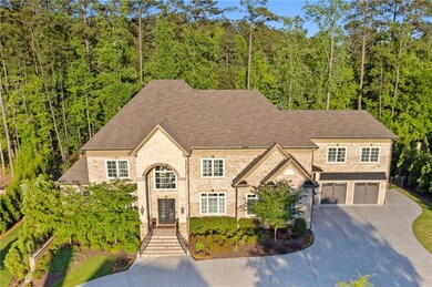 View of front of house featuring roof with shingle