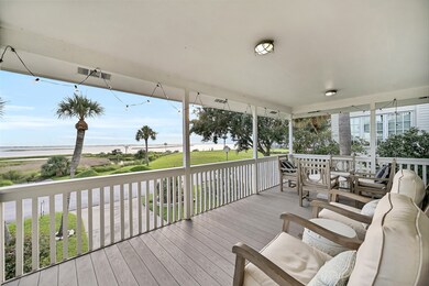 Another view of the covered porch that wraps aroun
