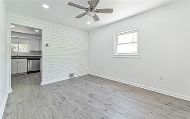 Shiplap wall in living room.  Entire house has bee
