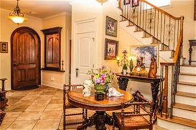 The entry foyer is stunning with new Italian stone