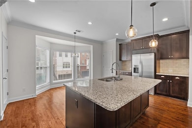 Kitchen with tasteful backsplash, dark wood-style 