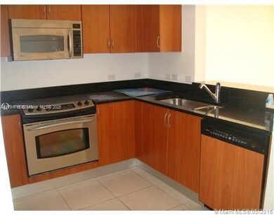 Beautiful open kitchen with plenty of closet space.