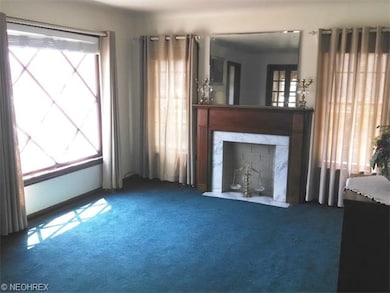 Living room, gas fireplace, lots of day light