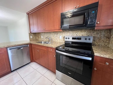 Boca Teeca III unit 123, Boca Raton, FL 33487 - photo 2