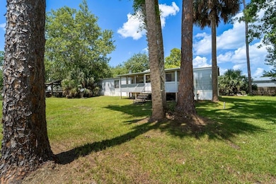 24031 Armadillo Rd, Astor, FL 32102 - photo 3