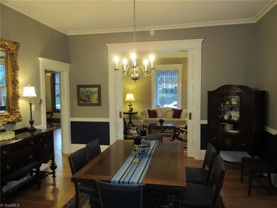 Dining room... Living Room viewed near center through the pocket doors.