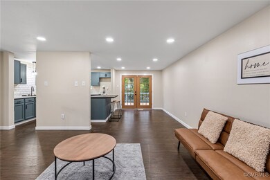 Living room featuring dark hardwood / wood-style f