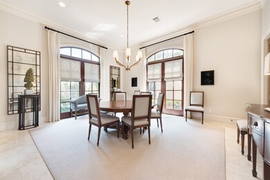 [DINING ROOM 18 x 15]
 Dining room with French doors that overlook front gardens.