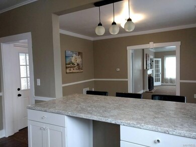 Kitchen view into dining room and living room (14 