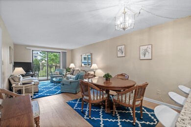 Dining area with a chandelier, wood finished floor