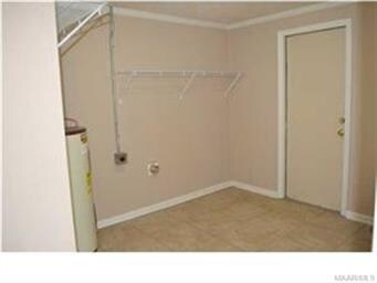Separate laundry room is just off the kitchen.