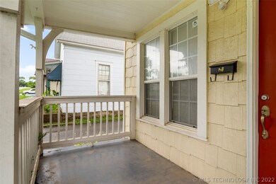 Cute Front Porch! Perfect for a swing set!