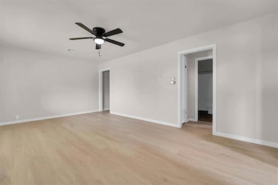 Living area with light wood like floors