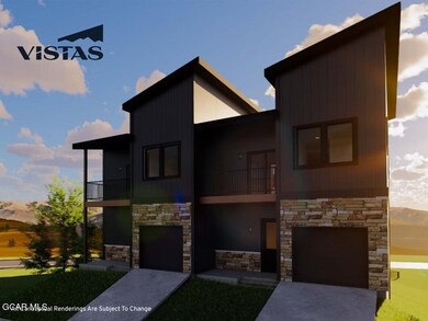 Contemporary house featuring stone siding, a balco