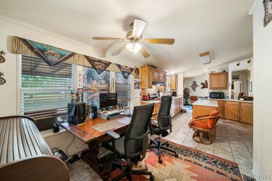 eat in kitchen space with large windows looking at