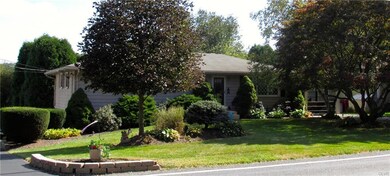 2 separate driveways, each with a 1 car garage.  2