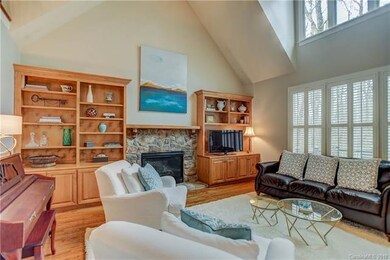2-story wall of windows allows loads of natural li