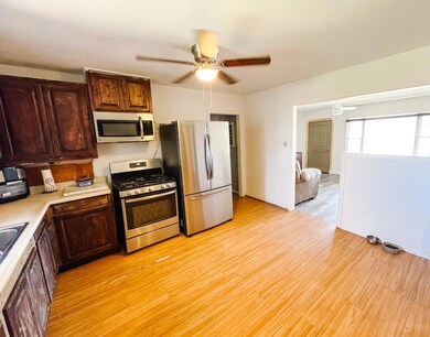 Kitchen featuring appliances with stainless steel 
