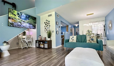 Open living area includes all furnishings and decor