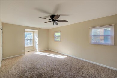 Master Bedroom with lots of window for lots of nat