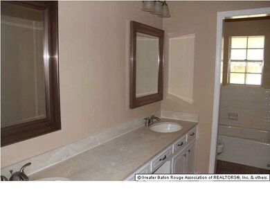 Double vanity and decorative mirrors in additional