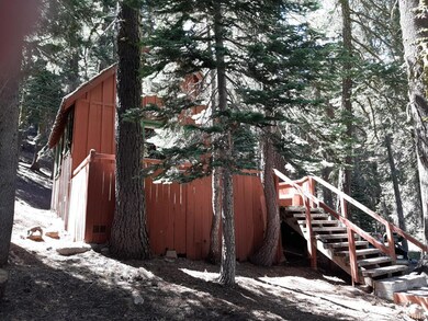 Front of cabin with stairs to decks