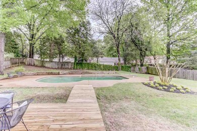 Take a dip in the sparkling in-ground gunite pool 