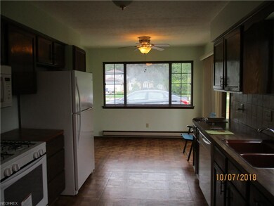 A dining area with a large picture window is perfe