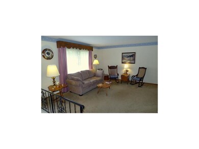 LIGHT-FILLED LIVING ROOM-HARDWOOD UNDER CARPET!