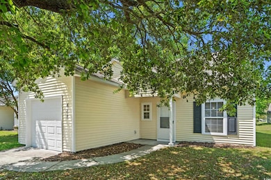 View of front of home featuring a front lawn and a