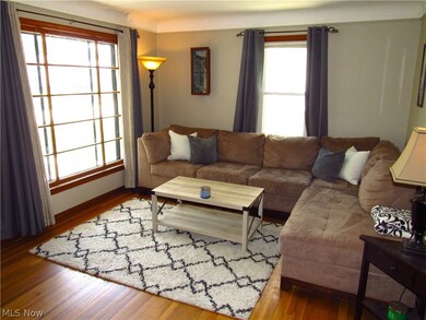 Living room with plenty of natural light and wood-type flooring