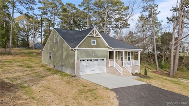 View of front of home with crawl space, driveway,