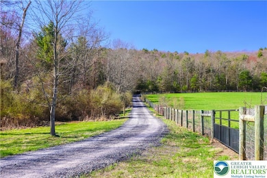 Enter on Gated, Private Driveway
