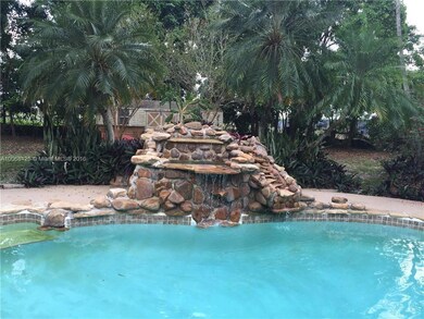 Pool with stone waterfall