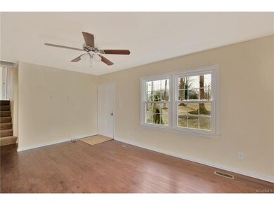 Living room with new hardwood floors, new windows 