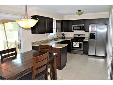 451 Maple Ave, Sheffield Lake, OH 44054 - photo 2