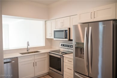 3235 Cypress Glen Way unit 309, Naples, FL 34109 - photo 2