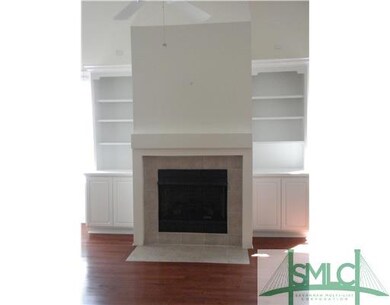 Living Room. Gas fireplace with built-in bookcases