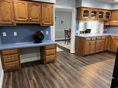 Kitchen featuring dark hardwood / wood-style floor