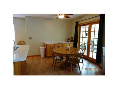 Dining Area. French doors lead to beautiful 3 seas