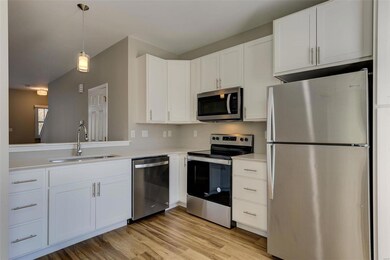New Whirlpool appliances: refrigerator, smooth-top