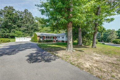 Single story home featuring a front yard