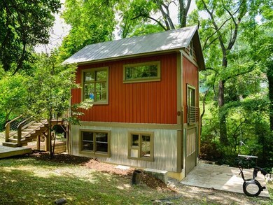 Cottage with workshop and swing!